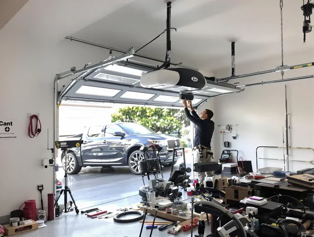 Green Garage Door Repair specialist installing smart garage door opener system in Green home