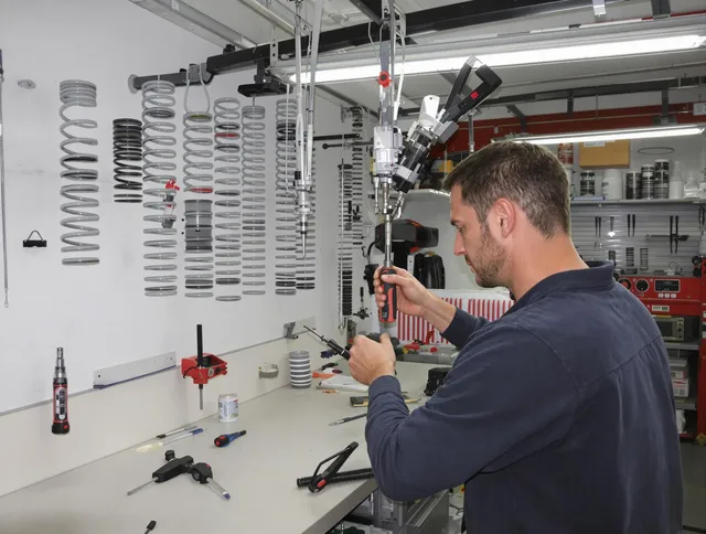 Green Garage Door Repair safety certified technician performing precision spring replacement in Green